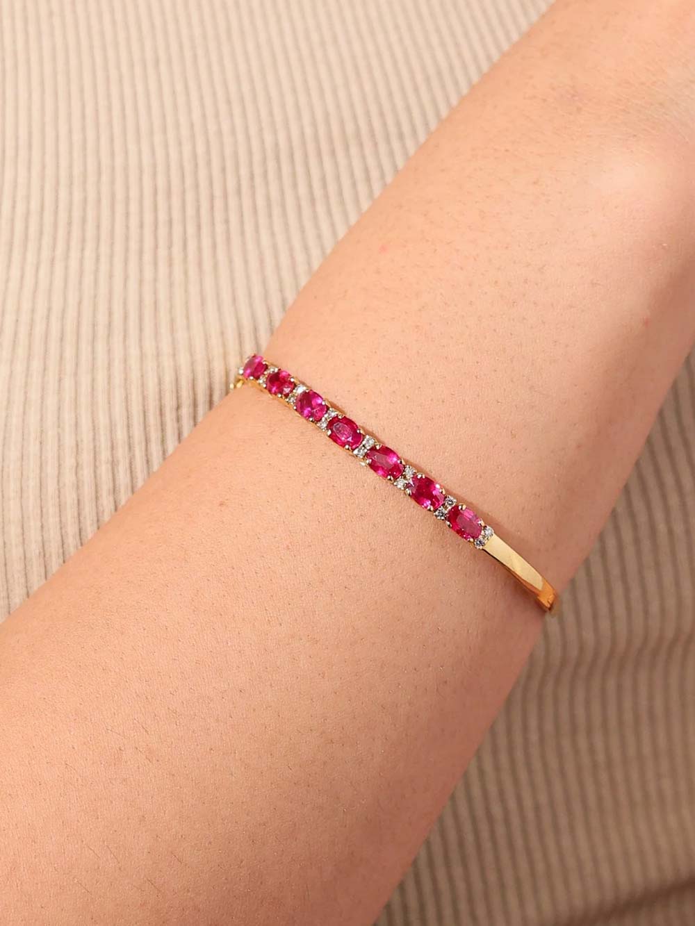 Pink Sapphire Line Bangle in Yellow Gold