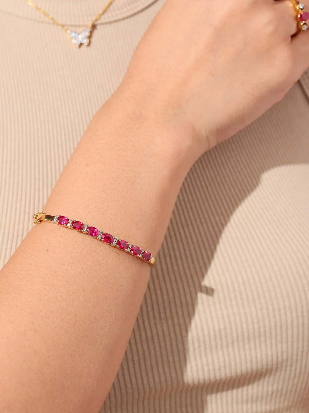 Pink Sapphire Line Bangle in Yellow Gold