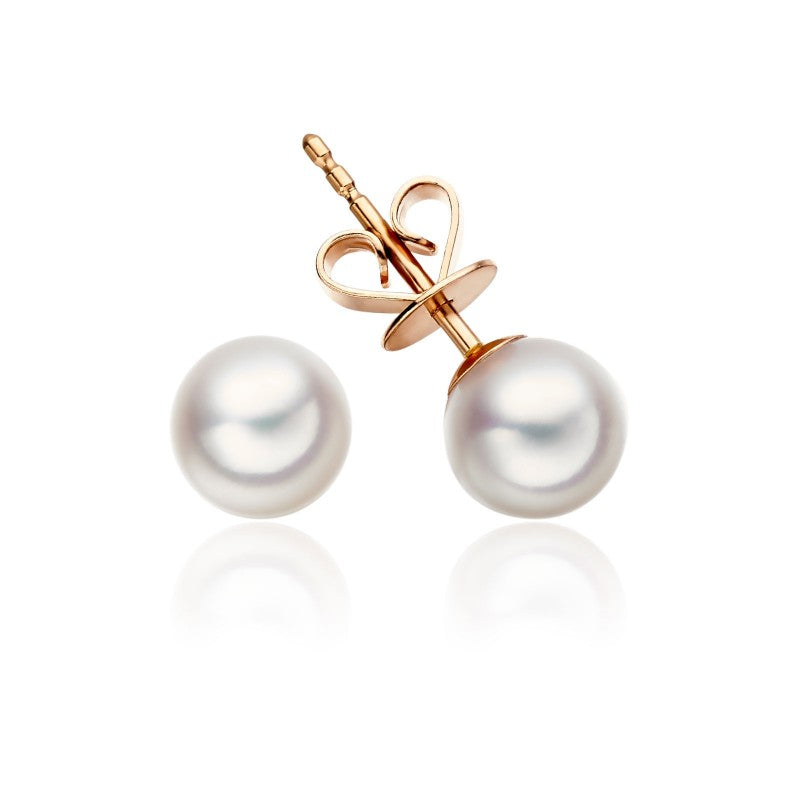 Freshwater pearl studs in yellow gold